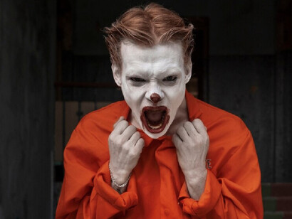 A clown character screaming expressing his emotional instability 