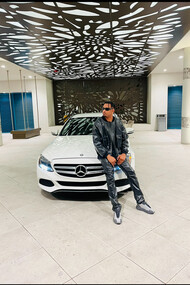 Gary Lewis blends style and and ambition in front of his Mercedes Benz