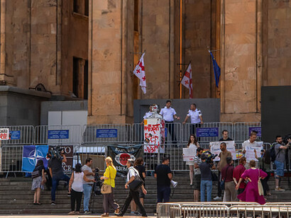 Demonstrators assemble near the parliament building in Tbilisi, Georgia