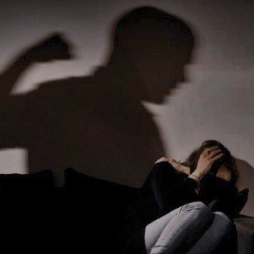 A man showing violence towards a woman