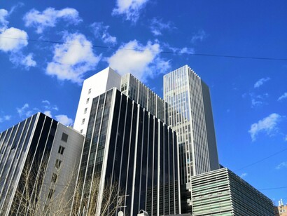 Corporate towers that have become a symbol of progress but are bereft of any sense of community and true connection 