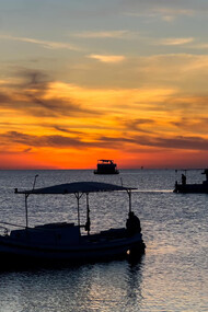 As the sun sets over the island of Kerkannah, Tunisia, the sky becomes a canvas of intense reds and deep oranges, a perfect backdrop for an artist’s reflection, image taken by Pierre Gassin