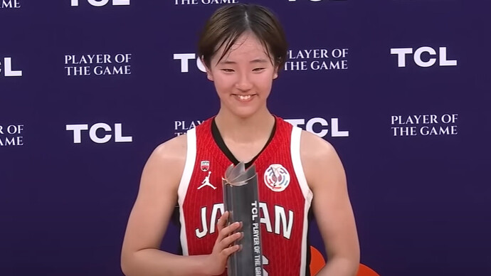 Kokoro Tanaka beams with pride after earning Player of the Game honors