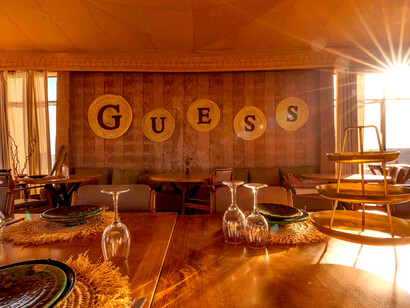Guess is reshaping the White Camel Resort in Morocco’s Agafay Desert into a setting that mirrors the brand’s current narrative direction
