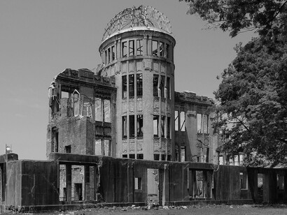 The Hiroshima Peace Memorial Dome standing under a bright, clear sky in Hiroshima, Japan