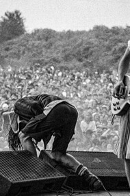 Pearl Jam's raw energy on stage at the 1992 Pinkpop Festival in Landgraaf, Netherlands, perfectly encapsulated the rebellious spirit of grunge, where torn jeans, flannel shirts, and unkempt hair became symbols of anti-fashion and individuality