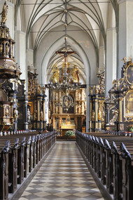 St. Catherine's Church (Polish: Kościół św. Katarzyny, German: Katharinenkirche) is Gdańsk’s oldest church, begun in the 1220s and later expanded with Gothic chapels, a gabled roof, and vaulted ceilings, Poland