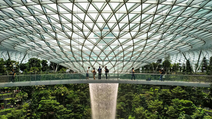 The lush interior of Jewel Changi Airport in Singapore, blending nature with modern architecture