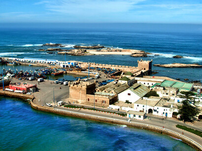Aerial view of the historic Essaouira Harbour in Morocco, illustrating how Morocco has launched a huge effort to improve transportation
