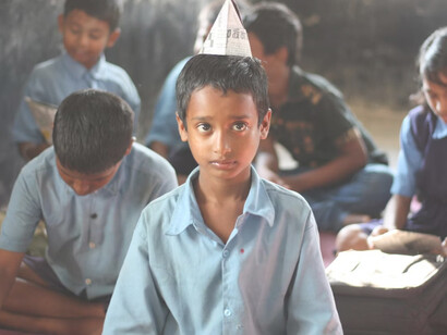 Indian children attending class in a school setting