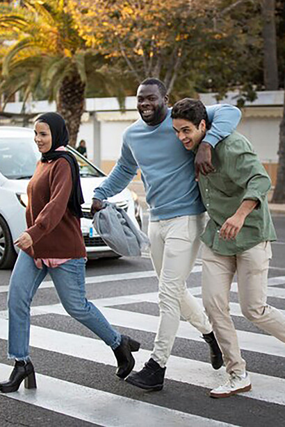 Immigrants adjusting to life in a new country, showing the challenges and joys of building a new identity in a foreign land