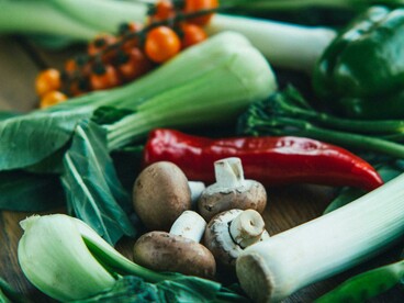 Fresh vegetables on a wooden table — natural, healthy, Paleo diet ingredients