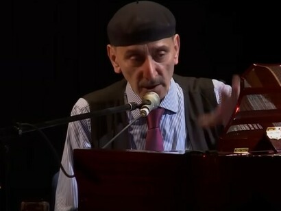 Ziad Rahbani performs on stage in Beirut, blending classical Arabic music with jazz and political satire