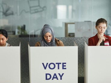 Women casting their votes during the New York mayoral election, a key moment in New York City politics