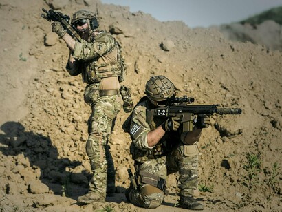 Armed troops advancing with precision, representing the battlefield outcomes of decisions made in distant capitals