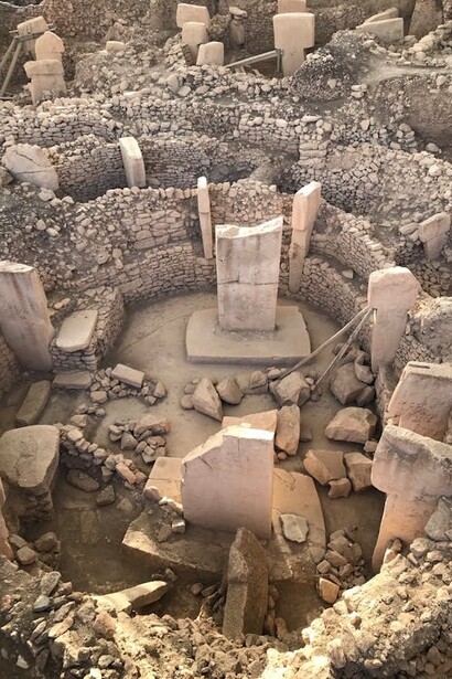 Göbekli Tepe is a Neolithic archaeological site located in Upper Mesopotamia (al-Jazira) in present-day Turkey. The settlement was inhabited from around 9500 BCE to at least 8000 BCE, during the Pre-Pottery Neolithic period