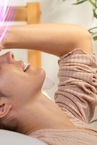 Experience the transformative healing process with a serene side-view smiley woman, promoting stress reduction and nurturing the mind-body connection