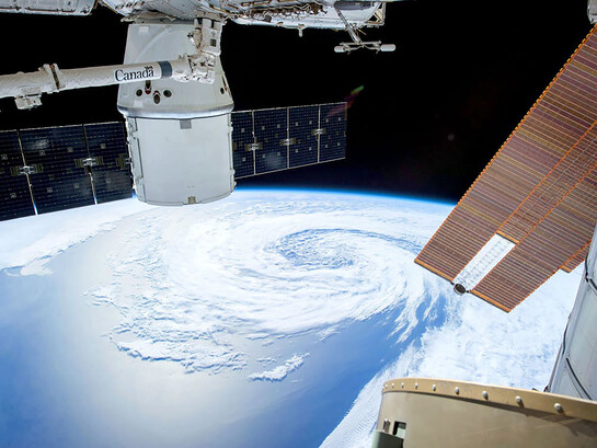 A satellite orbiting above the Earth