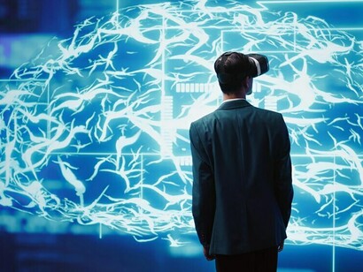 Engineers use VR headsets to explore AR holograms, studying the structure of AI neural networks