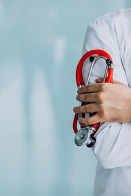 A physician in a medical robe with a stethoscope, embodying the principles of medical ethics, healthcare, and empathy