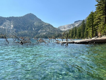 A person kayaking across Emerald Bay on Lake Tahoe, California