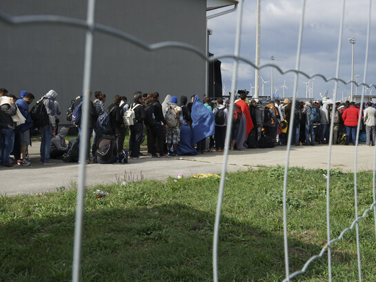 A line of Syrian refugees crossing the border of Hungary and Austria on their way to Germany. Hungary, Central Europe, 6 September 2015