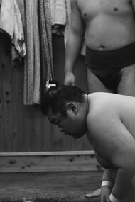 Man prepares for sumo wrestling