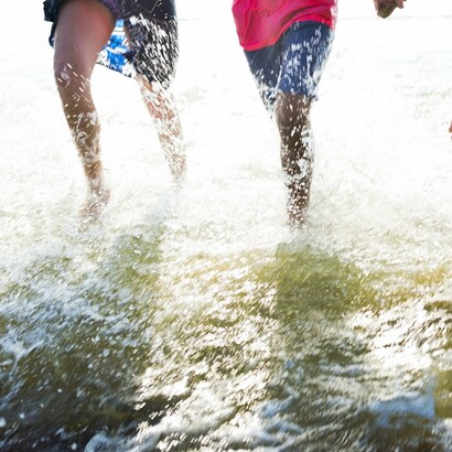 The ocean challenges your balance and speed, making every wave-dodging dash a full-body fitness win