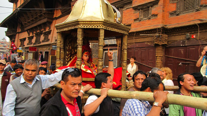 The living goddess Kumari returns to the Kumari Ghar after attending the Seto Machhindranath parade in Kathmandu, Nepal