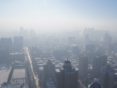 Smog blankets Chinese cities, a visible reminder of the tension between development and public health