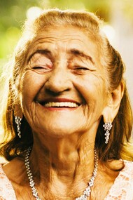 Elderly woman smiling with joy