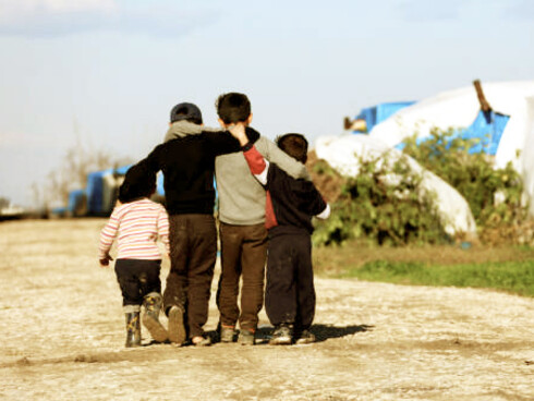Syrian refugees in a camp, displaced by war, struggling to survive in the face of ongoing conflict and uncertainty
