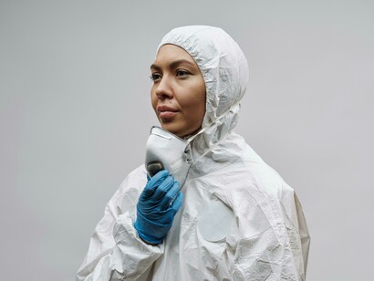 Doctor in a clinical setting wearing a face mask during the height of the COVID-19 crisis