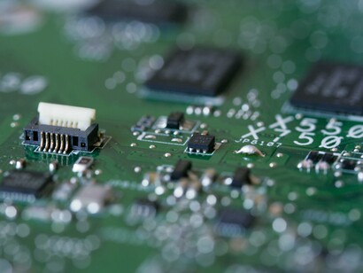 Circuits etched in silicon embody the physical roots of ambition in a digital world