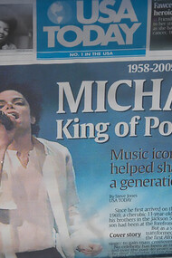 A 2009 newspaper reports on the death of Michael Jackson