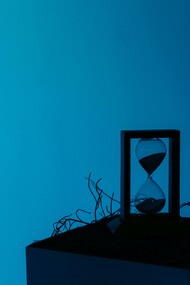 In silence, the hourglass measures the unseen: every falling grain is a moment slipping from present into memory
