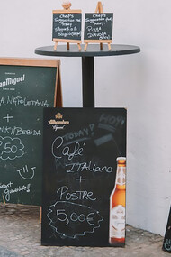 Outdoor café menu display, inviting customers with its selection of dishes and showcasing the café’s offerings