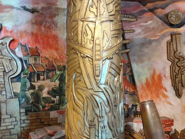 Inside the museum, shattered metal and bold imagery evoke the chaos—and courage—of wartime Hanoi © Photo by Daniel Gauss