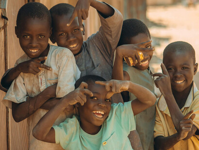 Strong family networks, cultural traditions, and community solidarity continue to provide social support in times of crisis