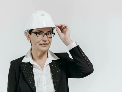 An architect equipped with digital tools ready to make on site decisions about project planning 