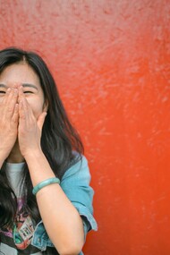 A woman, with a funny personality