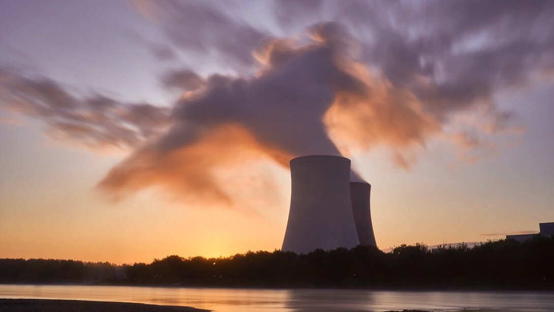 As smoke billows from the coal power station's steel drum, the complexity of the socio-economic impacts of transitioning away from coal becomes increasingly evident