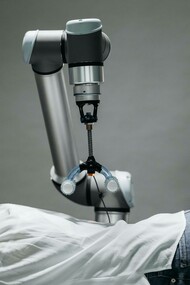 
A doctor using the chatbot on a patient as a means to accelerate healthcare