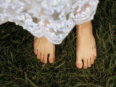 Grounded in the present moment, where body and earth gently meet.