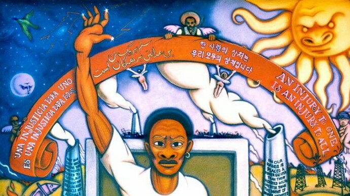 Mural con la frase "Una injusticia para uno, es una injusticia para todos"
