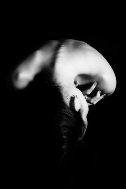 Artistic nude photography in black and white can explore the emotional weight of body image struggles shaped by the beauty ideals seen on social media