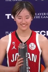 Kokoro Tanaka beams with pride after earning Player of the Game honors