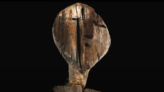 The Shigir Idol on display at the Sverdlovsk Regional Museum, Russia — Standing over five meters tall in its original form, this ancient sculpture continues to awe with its mysterious carvings