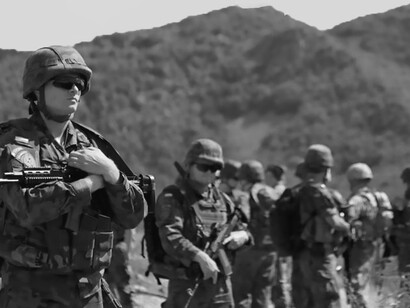 Polish Army soldiers serving as part of NATO's Kosovo Force peace support mission prepare to begin a joint Administrative Boundary Line foot patrol Aug. 18, 2015, in northern Kosovo