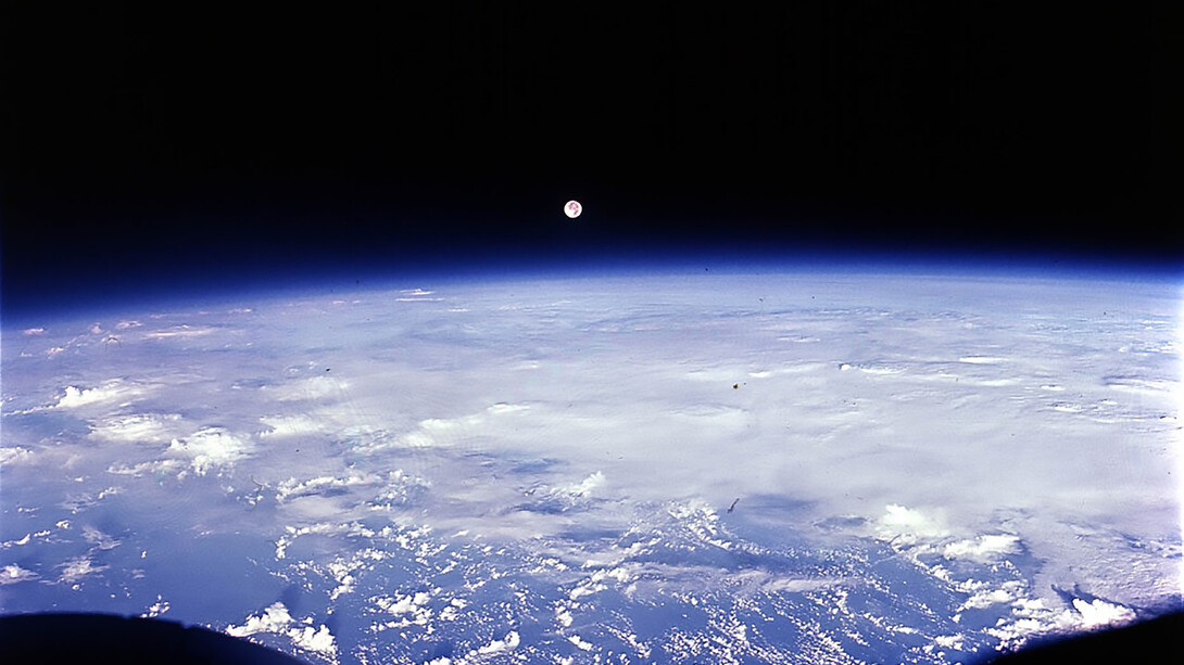 The full moon seen over Earth, photo taken by Gemini 7, 1965